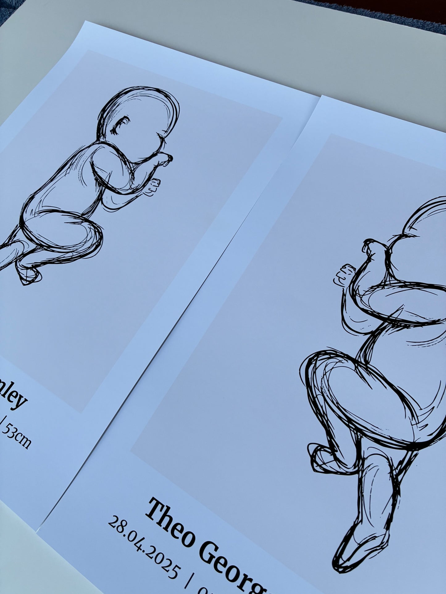 Two black and white line drawings of a baby on a light background. Baby birth poster, baby poster for brothers, newborn gift photo