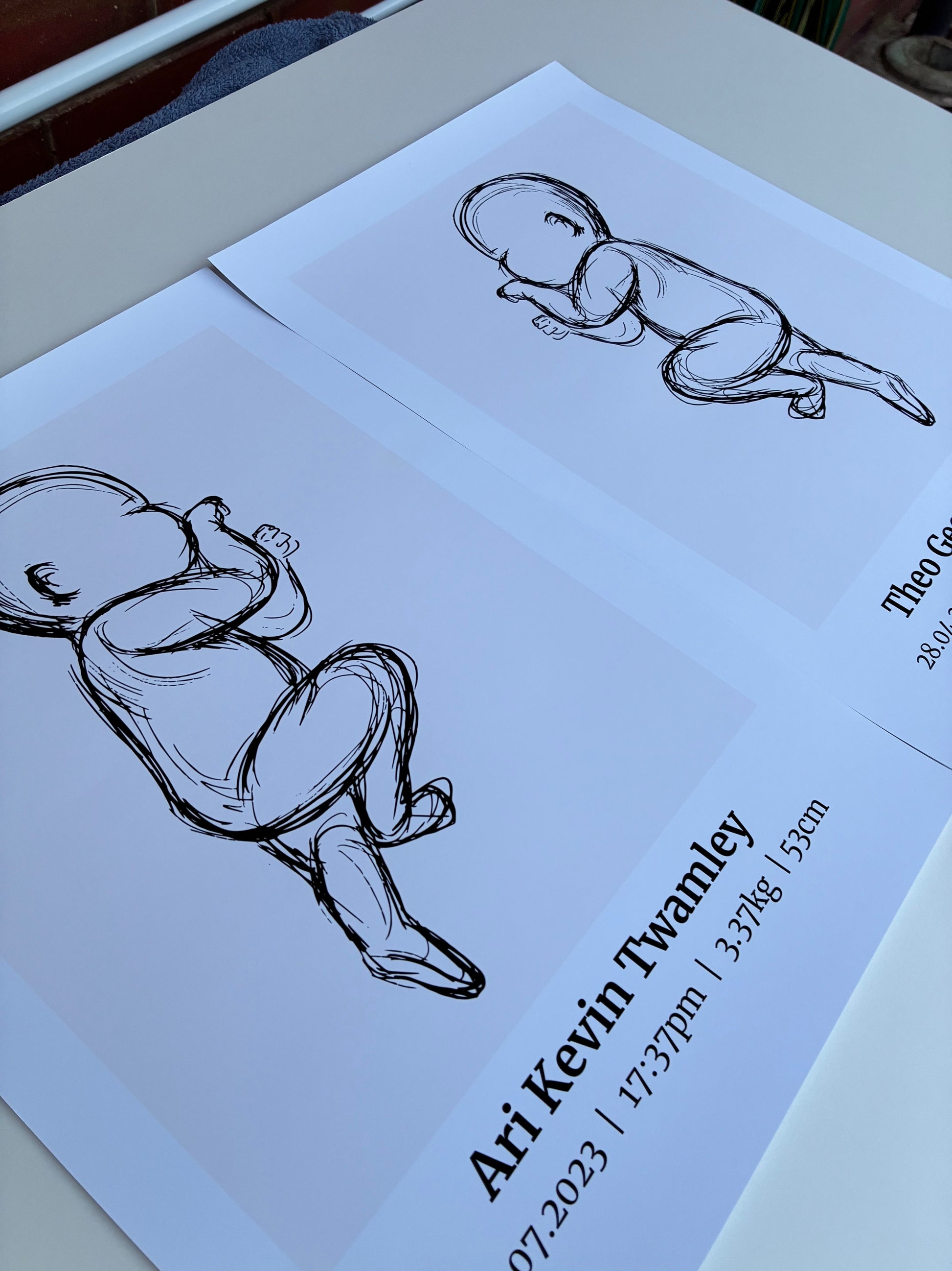 Drawings of babies on paper with text details on a light surface

Two black and white line drawings of a baby on a light background. Baby birth poster, baby poster for brothers, newborn gift photo

gift fo newborn baby
baby birth details 
baby birth poster
